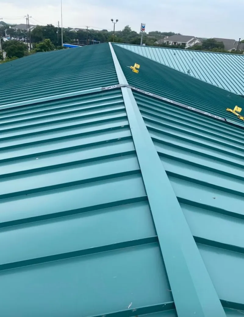 Green commercial metal roof ridge and valley for Metal Roof Repair in Arlington Heights